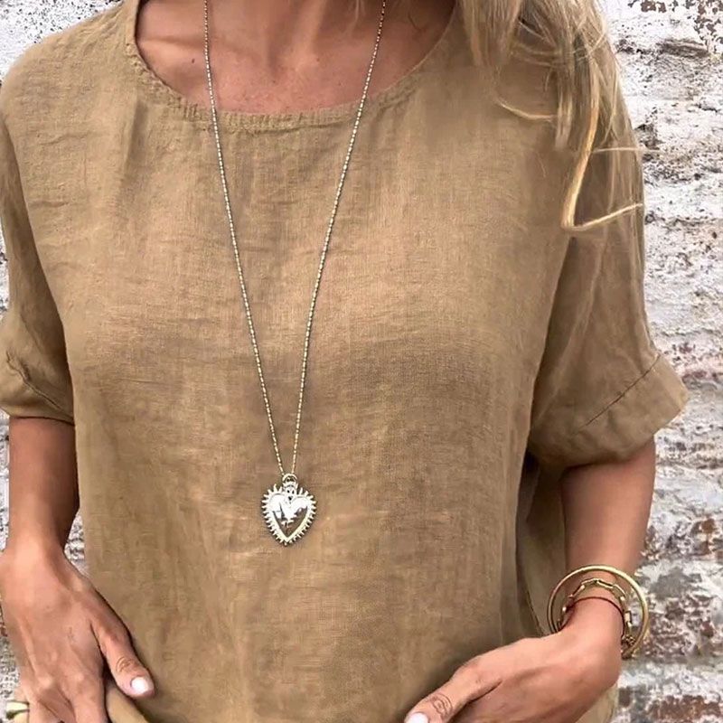 Bluse i bomulds-linned: komfort og elegance i hverdagen